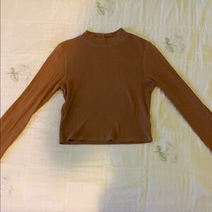 Burnt orange long sleeve turtleneck. American eagle, eyelet pattern. Medium.